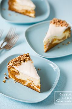 three slices of carrot cake on blue plates