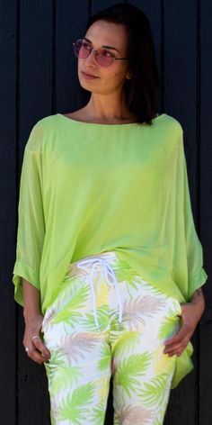 Our best seller 100% Silk Solid Kaftan Style Blouse in 20 different colors! Such a nice Style with a Gorgeous Exotic Look! 100% Silk Fits sizes XS- XL Made in Italy Relaxed Fit Long Sleeve Top For Beach Cover-up, Solid Summer Tops For Beach, Solid Summer Tops For The Beach, Flowy Top For Beach Cover-up In Spring, Stretch Long Sleeve Tops For Beach Season, Solid Color Beachwear Top For Day Out, Chic Green Blouse For Vacation, Summer Beach Cover-up Flowy Blouse, Solid Color Relaxed Fit Top For Beach