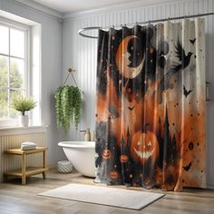 a halloween themed shower curtain with pumpkins and bats in the sky, on a bathroom floor