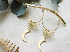 big brass hoop earrings with sun and moon Those stunning hoop earrings were made with love and are designed to stand out. One earring measures approx. 7 x 3 cm. The brass hoop has a diameter of 3 cm and the wire itself has a diameter of 0,8 mm. ~❋ Good to know ❋~   ▸ it's designed and handcrafted with love  ▸ high quality indian brass beads, nickel free, no allergies --✦--✦--✦--✦--✦--✦--✦--✦--✦--✦--✦-- ~❋ maraba design ❋~ I believe in magic, in love, in beauty and in the good within every single Brass Earrings Handmade, Earrings Handmade Boho, Modern Hoop Earrings, Handmade Boho Jewelry, Brass Hoop Earrings, Brass Beads, Brass Hoops, Micro Macramé, Believe In Magic