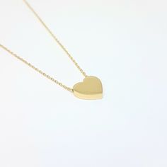 -The heart necklace for women is made with high quality 14K real solid gold. - This cute, charm, dainty, delicate and trendy women jewelry pendant necklace has been artfully designed for timeless yet modern millennial fashion and you can order in three different colors, yellow, white and rose gold. -We have listed the same heart model as a bracelet . - This 14K real solid gold pendant comes with a beautiful matching 14K real gold chain. - You receive the pendant in a beautiful and free gift box Gold Minimalist Heart Necklace For Anniversary, Minimalist 14k Gold Heart Necklace For Anniversary, Minimalist Heart Charm Necklaces For Anniversary Gift, Simple Gold Heart Necklace For Valentine's Day, Minimalist Charm Necklace For Anniversary, Simple Gold Charm Necklace For Valentine's Day, Dainty Charm Necklaces For Anniversary Gift, Minimalist Yellow Gold Charm Necklace For Anniversary, Simple Charm Necklaces For Valentine's Day Gift