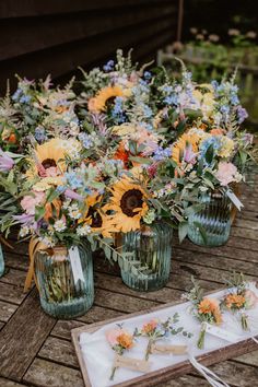 Pastel wedding bouquets with sunflowers with simple buttonholes Woodland Summer Wedding, Wild Flower Fall Wedding, Spring Boho Wedding Ideas, Spring Farm Wedding Colors, Wild Flower Wedding Theme Decor, June Country Wedding, Wedding Altar Ideas Church, Spring Wedding With Sunflowers, Wild Flower Wedding Theme Ceremony Decor