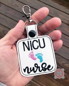 "Listing is for one NICU Nurse keychain The NICU nurse key chain measures approx. 2 1/2\" x 4 1/4\" including the key ring. The nurse keyring is made with marine vinyl and embroidery thread and comes with a spit key ring or lobster swivel clasp. Your item will be ready to ship within the estimated timeframe provided at checkout. Your order will be shipped via USPS and generally takes 2-3 business days to arrive. Thank you for supporting this small business. Pin this item for later: www.pinterest Nurse Keychain, Nurse Study, Nurse Study Notes, Baby Nurse, Pediatric Nurse, Nursing Accessories, Mommy Gift, Nursing Baby