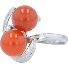 Transport into a tapestry of taste with the Platinum Coral Bead Ring, a mesmerizing piece that harmonizes the raw elegance of coral with the lustrous allure of platinum. Delicately crafted, this ring showcases a captivating coral bead, its natural beauty enhanced by the surrounding platinum setting. Nestled amidst this enchanting centerpiece are shimmering diamonds, adding a touch of sparkle and sophistication to the design.With a total diamond weight of 0.06 carats, these precious gems dance gracefully around the coral bead, catching the light with every movement. The platinum 900 metal type ensures durability and timeless radiance, making this ring a symbol of refined luxury and enduring style. Sized at 4.5, it's a perfect fit for those who appreciate the finer details and exquisite craf Formal Coral Ring, Elegant Coral Ring Jewelry, Elegant Coral Rings For Anniversary, Elegant Coral Jewelry For Anniversary, Coral Elegant Wedding Rings, Elegant Coral Wedding Rings, Elegant Formal Rings With Natural Stones, Elegant Coral Sterling Silver Jewelry, Elegant Red Rings With Natural Stones