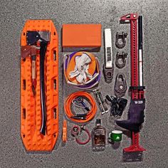 an assortment of tools laid out on a table