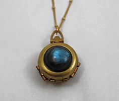 Unique Locket Necklace, Unique Locket, Blue Gray Gold, Moon Phases Necklace, Memory Locket, Vintage Lockets, Family Album, Blue Gemstones, Pretty Jewellery