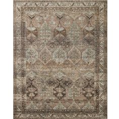 an area rug with many different colors and patterns on the carpet, including beiges, browns