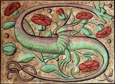 an intricately decorated wall panel with flowers and lizards on it's sides, in the shape of a letter e