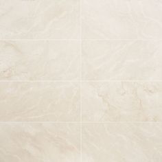 a white tiled floor with no tiles on the top and bottom, in various shades of beige