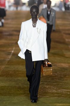 Louis Vuitton Men’s Spring 2024 [PHOTOS] – WWD Pharrell Williams Louis Vuitton, Must Have Accessories, Black Men Fashion Urban, Louis Vuitton Trunk, Louis Vuitton Collection, Louis Vuitton Jewelry, Outfit Grid, Spring Summer 2024