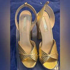 Leather Like Gold Platform Size 9 Worn Once Gold Sandals With Wrapped Heel For Vacation, Trendy Gold Sandals With Wrapped Heel, Gold Ankle Strap Heels For Vacation, Trendy Gold Sandals For Formal Occasions, Trendy Gold Formal Sandals, Elegant Gold Heels For Vacation, Gold Heels For Spring Vacation, Gold Open Heel Vacation Heels, Gold Platform Sandals