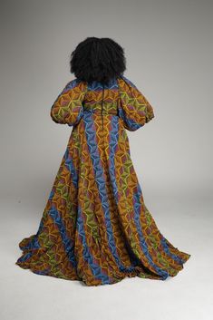 Our Elegant African Print Maxi or Ball gown. This Ankara ball gown with puff sleeve can be altered and customized to suit your preferred style. The maxi dress is handmade to order and with your right measurements you’ll get the perfect fit. This beautiful long sleeves length African print maxi dress is made for all events. I have size Medium, large and Xlarge in stock, other size are made to order. Round neck. .Material 100% African print cotton. .Long straight sleeves. .Perfect summer/spring/ a Fitted Multicolor Long Sleeve Gown, Multicolor Fitted Long Sleeve Gown, Fitted Maxi Dress With Balloon Sleeves For Evening, Fitted Balloon Sleeve Maxi Dress For Evening, Fitted Balloon Sleeve Evening Maxi Dress, Maxi Dress With Gathered Sleeves, Casual Maxi Dress With Gathered Sleeves, Puff Sleeve Maxi Dress With Fitted Bodice For Wedding, Dress With Balloon Sleeves And Voluminous Skirt