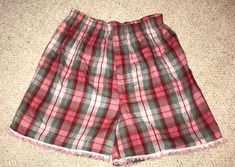 "100% cotton flannel shorts/bloomers. 28\" unstretched and 44\" stretched.  Patched and Upcycled  Zip fly has been sewn down. Cute to wear indoors when relaxing or with T-shirt when out!" Plaid Cotton Bottoms With Elastic Waistband, Cotton Shorts For Pajama Party, Cotton Shorts With Elastic Waistband For Pajama Party, Casual Pink Cotton Bloomers, Plaid Pajama Shorts With Elastic Waistband, Plaid Shorts For Loungewear, Cotton Bloomers For Loungewear, Pink Cotton Shorts For Daywear, Casual Pink Short Bloomers