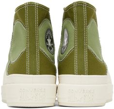 Converse.Khaki Chuck Taylor All Star Construct Sneakers.High-top paneled canvas sneakers colorblocked in tones of khaki..· Round rubber cap toe.· Lace-up closure.· Rubber overlay at vamp.· Eyelets and rubberized logo patch at inner side.· Logo embossed at rubber midsole.· Treaded rubber outsole.Supplier color: Alligator friend/Grassy.Upper: textile. Sole: rubber..Made in Viet Nam..231799F127141 Babe Shoes, Khaki Converse, Emo Clothes, House Items, Fall Bags, Emo Outfits, Converse Sneakers, Sneaker Collection, Canvas Sneakers