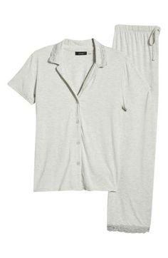 Drift off to dreamland or lounge in the luxury of these supersoft jersey pajamas detailed with delicate lace trim. Top has notched collar; short sleeves 95% Lenzing™ EcoVero™ viscose, 5% spandex with 62% nylon, 33% recycled nylon, 3% recycled spandex, 2% spandex trim Lenzing EcoVero viscose is a sustainably produced fiber using pulp made from renewable wood sources and certified with the EU Ecolabel for high environmental standards, including lower emissions and water usage than generic viscose Relaxed Fit Lace Trim Sleepwear For Loungewear, Casual Sleepwear With Lace Trim And Short Sleeves, Cotton Sets With Lace Trim And Short Sleeves, Casual Short Sleeve Sleepwear With Lace Trim, Cotton Short Sleeve Sets With Lace Trim, Cotton Lace Trim Sets With Short Sleeves, Lace Trim Top, Pebble Stone, Water Usage