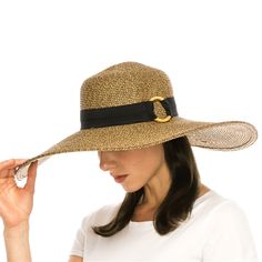 A fabulous straw beach hat. Grosgrain band with large bamboo ring detail. Slightly floppy brim, 6" wide. Ribbon inner band with drawstring to reduce size. UPF 50+ rated sun protection hat. The extra wide brim provides excellent sun coverage. One size, 57 cm. 100% paper braid. Chic Braided Straw Sun Hat, Elegant Braided Straw Hat For Beach, Adjustable Gold Panama Hat With Wide Brim, Gold Wide Brim Straw Hat, Elegant Braided Sun Hat For The Beach, Gold Straw Hat With Curved Brim For Vacation, Elegant Braided Sun Hat For Beach, Chic Brimmed Braided Sun Hat, Chic Braided Sun Hat With Curved Brim