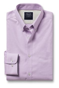 Creases drop out naturally from this shirt's lightweight, 100% cotton poplin weave that's equal parts breathable and durable. Traditional Oxford weave Non-iron with added stretch Model is wearing a size Medium Model's Height: 188cm/ 6'2 Business Casual Purple Cotton Shirt, Purple Cotton Business Casual Shirt, Purple Fitted Cotton Shirt, Purple Cotton Dress Shirt For Work, Purple Cotton Shirt For Business, Purple Cotton Business Shirt, Classic Purple Cotton Tops, Classic Purple Summer Shirt, Purple Cotton Classic Style Tops