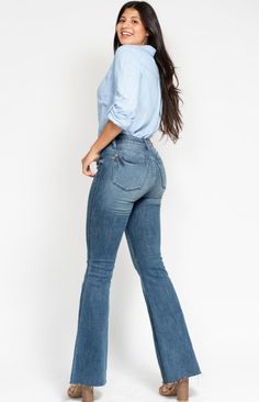 Achieve the ultimate flattering silhouette with Judy Blue Mid Rise Tummy Control Jeans. These vintage wash jeans feature a stylish cut hem and flare leg design, perfect for versatile styling. The mid-rise waistband also offers tummy control for a comfortable and confident fit. Details:- Flare Leg- Tummy Control for Slimming Effect- Raw Hem- Stretchy Denim Fabric Content:- 74% Cotton, 11% Polyester, 6% T400, 7% Rayon, 2% Lycra Mid-rise Medium Wash Flare Jeans, Dark Wash Mid-rise Flare Jeans, Mid-rise Dark Wash Denim Flare Jeans, Mid-rise Dark Wash Flare Jeans, High Rise Medium Wash Denim Flare Jeans, High Rise Medium Wash Flare Jeans, Mid-rise Non-stretch Washed Blue Jeans, Fitted Flare Jeans With Frayed Hem In Medium Wash, Non-stretch High Rise Medium Wash Flare Jeans