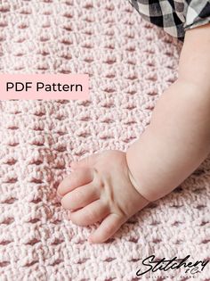 a baby's hand on top of a pink crocheted blanket with the words,