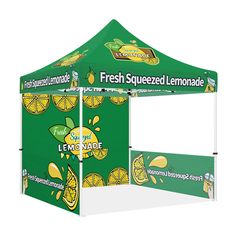 a green and white tent with lemonade on it