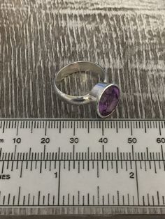 Handcrafted, gemstone and sterling silver ring. The second photo displays the ring above a mm and inches ruler. SHIPPING DETAILS This item ships from our shop located just outside of Kipling, North Carolina, USA. Please allow 1-2 days for packaging. Expedited shipping and gift wrapping services are also available. GUARANTEE Your complete satisfaction or return for a full refund of your purchase price. ABOUT US Over the years, I've traveled and talked with great craftsmen from all around the worl Classic Sterling Silver Gemstone Ring, Sterling Silver Jewelry With Large Stone, Formal Sterling Silver Rings With Large Stone, Formal Sterling Silver Ring With Large Stone, Classic Ring With Large Stone, Sterling Silver Jewelry With Large Stone For Anniversary, Sterling Silver Ring With Large Oval Stone, Sterling Silver Large Stone Promise Ring, Sterling Silver Hallmarked Birthstone Ring With Round Cut