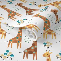 giraffes and flowers on white wallpaper with blue, green, yellow and orange colors