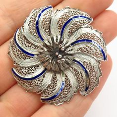 925 Sterling Silver Vintage Portugal Enamel Filigree Floral Design Pin BroochWeight: 9.6gWELCOME TO PAWN SHOPWe are an actual pawn shop and have been in business for over 25 years.Since 1990, our establishment has been serving a variety of clients by providing them with short term cash solutions and options of liquidity regarding their treasured heirlooms.Acknowledging that today′s customers are very sophisticated and are looking for a variety of investments, our acquisitions are hand-picked for Ornate Silver Enamel Brooches, Victorian Silver Enamel Brooches, Silver Victorian Enamel Brooches, Silver Brooch Enamel Pin As Gift, Silver Brooch Enamel Pin For Gift, Formal Silver Enamel Brooches, Silver Enamel Brooch Pin, Vintage Silver Enamel Pin Collectible, Vintage Silver Collectible Enamel Pin