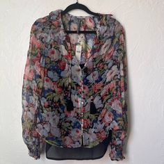 Nwt. Size Large. Floral With Ruffle Collar. Has A Black Cami Underlay. Smoke Free Home. Measurements Available Upon Request. Spring Tie-neck Top With Button Closure, Spring Tie Neck Top With Button Closure, Spring Tie Neck Tops With Button Closure, Twofer Sweater, Pink Lace Tops, Black Cami, Sequin Sleeve, Tuxedo Style, Sheer Long Sleeve