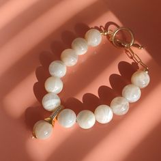 New Product ! All Of Our Gemstones Are Demagnetized With Sea Salt To Keep The Gemstones Pure And Alive! & One Of A Kind, Unique Jewelry ; & 100% Original Design & Handmade & Made In Nyc; Size: 6 - 7" Adjust Size , Fit Most Wrist Sizes. Material: Natural Quality Moonstone 12mm, 14k Yellow Gold Over 925 Sterling Silver With Cz Pendant And 14k Gold Filled. Gold Moonstone Round Bracelets, Elegant Moonstone Crystal Bracelet For Gift, Gemstone Moonstone Bracelets, Elegant Moonstone Jewelry With Round Beads, Elegant Moonstone Gemstone Beaded Bracelets, Elegant Moonstone Gemstone Bracelets, Elegant Moonstone Beaded Bracelets, Elegant Moonstone Gemstone Bracelet, Elegant White Moonstone Beaded Bracelets