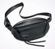 Turn up the heat with this cool leather belt bag that offers hands-free convenience and versatile carrying options (thanks, Aimee!). Wear it around your waist or rock it across the body -- this trend-right style looks fab either way.  The adjustable strap allows for a comfortable, custom fit every time. And the spacious main compartment provides easy access to your everyday items -- from cash to cards to that bright new lipstick you're loving. It even has space to store a portable mini fan (for Fall On-the-go Belt Bag With Adjustable Strap, Casual Leather Belt Bag With Removable Belt, Casual Leather Bag With Removable Belt, Versatile Leather Belt Bag, Trendy Leather Belt Bag With Removable Belt, Trendy Crossbody Belt Bag For Spring, Trendy Leather Belt Bag With Zipper Closure, Black Belt Bag For Everyday Summer Use, Black Belt Bag For Everyday Use In Summer