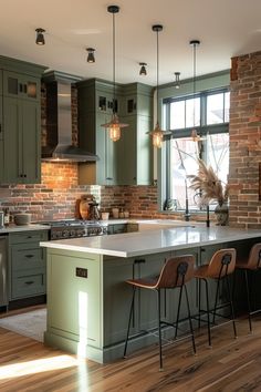 a kitchen with green cabinets and an island in front of the stove top, surrounded by bar stools