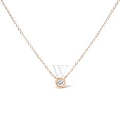 Embrace simplicity with a touch of timeless elegance with this exquisite pendant necklace, masterfully wrought from 10K rose gold, and adorned with a 1/10 carat round brilliant-cut diamond. The diamond's natural origin assures its unique character, its sparkle cradled in a modern bezel setting that reflects a sleek, contemporary allure. H-I color and SI2-I1 clarity ensure a near-colorless shimmer, with slight inclusions that narrate the stone's authentic journey. The pendant dangles gracefully from a delicate, adjustable cable chain, spanning 16 to 18 inches to complement any neckline, secured with a spring ring clasp for ease and confidence in wear. This piece is not just jewelry; it's a versatile token of luxury and refinement, designed to add a subtle hint of sophistication to every mom Solitaire Setting, Fragrance Gift Set, Denim Shoes, Crossbody Messenger Bag, 2 Carat, Round Brilliant Cut Diamond, Diamond Stone, Round Cut Diamond, Round Brilliant Cut