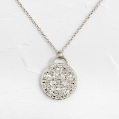 This solid 14k gold pendant is 19.5mm in diameter and 2mm thick. Also available in platinum.It features ten pear cut diamonds (3x4-3x5mm) and ten round white diamonds (1-1.5mm). All accent diamonds are SI clarity and G+ color.The pendant is available on its own or with a 20" cable chain that matches your choice of metal: solid 14k gold or platinum.We handcraft each piece with responsibly sourced metals and ethically sourced stones. Silver Diamond Necklace With Oval Pendant, Silver Pendant Necklace With Single Cut Diamonds, Oval Diamond Pendant Necklace With Rose Cut, Solitaire Pendant Necklace With Single Cut Cubic Zirconia, Diamond White Flower Pendant Necklace With Single Cut Diamonds, Luxury Silver Teardrop Pendant Diamond Necklace, Luxury Silver Diamond Teardrop Pendant Necklace, White Gold Flower Pendant Necklace With Single Cut Diamonds, White Gold Necklace With Single Cut Diamond Flower Pendant