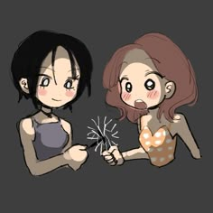 two girls are holding sparklers in their hands