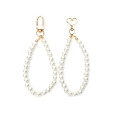 two pairs of pearl hoop earrings with gold clasps on each side and a heart charm hanging from the end