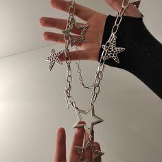 features: Stars and Starfish designed  style: Boho-hippie lenth of stars:   large - 5 cm /  small- 4 cm / starfish- 3.5 cm *Click the link to reach more fantrastic varieties of rings, earrings, necklaces, braceletc, anklets etc. https://www.etsy.com/uk/shop/SalihaDesigns?ref=shop_sugg *40% OFF on 3+ items. Use coupon CODE003 at the checkout. https://www.etsy.com/uk/shop/SalihaDesigns?coupon=CODE003 All photos on my page are original, not edited. *A great gift for lover of long necklace . *Two di Silver Star Necklace With Chain, Punk Style Star Shaped Metal Necklace, Punk Star-shaped Necklace For Parties, Metal Starfish Charm Jewelry, Trendy Star Charm Festival Jewelry, Punk Style Star Charm Jewelry As Gift, Star Charm Necklace For Festivals, Party Jewelry Starfish Charm, Starfish Charm Jewelry For Parties