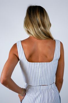 Introducing the Alice Stripe Crop Top, a luxurious addition to your wardrobe. Crafted with blue and white stripes, these shorts feature front pleats, button and zipper closure and elastic back for a comfortable fit. Pair it with the coordinating Alice Crop Top for a sophisticated and exclusive ensemble. Size + Fit Riley is 5’7” and wearing a size Small Content + Care 75% Cotton 25% Polyester Hand Wash Cold Color Separate Sneaker Heels Wedges, Matching Sets Outfit, Striped Crop Top, Sleeveless Crop Top, Sneaker Heels, Top Sales, Dress Romper, Striped Shorts, Bottoms Pants