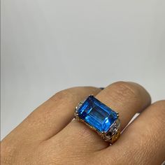 Genuine 925 Silver And Gold Vermeil Ring By Victoria Wieck Featuring A Stunning Genuine Bright Blue, Brazilian, Step Cut, Magic Swiss Blue Topaz. $375-565 Appraised Value Per Hsn. More Beautiful In Person. The Stone Alone Is Breathtaking + Then You Have The Details In The Basket- Giving You Something Gorgeous To See At All Angles. Sold Out Design. Craftsmanship Is Top Knotch + If This Doesn't Sell I'm Happy To Keep For Myself Hehe. Would Make A Unique Engagement Ring. Free Us Ship Blue Topaz Ring In 14k White Gold, Blue Topaz Ring With Emerald Cut And Gemstone Accents, Blue Topaz Ring With Gemstone Accents Emerald Cut, White Gold Topaz Ring With Gemstone Accents, White Gold Topaz Gemstone Ring, White Gold Topaz Ring With Gemstone, 14k White Gold Sapphire Topaz Ring With Accent Stones, Hallmarked Emerald Cut Topaz Ring In Sterling Silver, Luxury Hallmarked Blue Topaz Ring