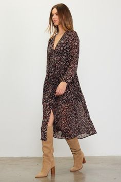 Make an entrance in this eye-catching midi dress. Delightfully detailed with a flurry of vibrant florals, its side slit and v neckline add a flirty flair. Long sleeves keep it understated, this versatile midi dress can be dressed up or dressed down. Recommended sizing 2-4 S, 6 M, 8-10 L Long Sleeve Dresses Fall, Vibrant Florals, Floral Print Midi Dress, Print Midi Dress, V Neckline, Short Story, Printed Midi Dress, Dress Code, Christmas Wishlist