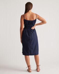 Discover the effortless charm of our 100% Organic Cotton Keyhole Midi Dress. Crafted with care from premium organic cotton poplin, this must-have dress has a cool, crisp look and a lightweight feel. The smocked bodice hugs your ribs in a flattering yet comfortable way, while the front tie and adjustable straps allow you to customize the fit. Best part: it has pockets! Easy to dress up or down, this chic silhouette works for a range of occasions.  | Quince | Women's Keyhole Midi Dress in Navy, Si Silk Tee, Keyhole Dress, Navy Midi Dress, Linen Blazer, Short Pajama Set, Polished Look, Quince, Cotton Poplin, Pajama Set