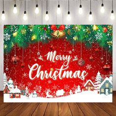 a merry christmas backdrop on a wooden floor