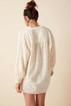 A feminine and flowy oversized blouse made from 100% cotton with subtle jacquard texture. Super soft and versatile. 100% Cotton.Delicate Wash or Dry CleanMade in PortugalAvailable in One SizeComfortably fits XS-LLength 53”Chest 17” Fall Cotton Tops With Crinkle Texture, Daywear Long Sleeve Tops With Crinkle Texture, Long Sleeve Tops With Crinkle Texture For Daywear, Fall Cotton Blouse With Crinkle Texture, Feminine Neutral Long Sleeve Tops, Effortless Long Sleeve Cotton Blouse, Neutral Relaxed Fit Long Sleeve Blouse, Long Sleeve Cotton Blouse With Crinkle Texture, Cotton Long Sleeve Blouse With Crinkle Texture