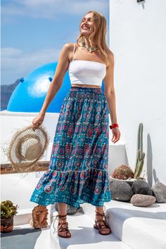 Make a statement with our Geo Print Smocked Maxi Skirt! With its eye-catching geometric print and comfortable smocked waist, this skirt is perfect for adding a touch of bohemian flair to your summer wardrobe. Product code: CAA02B4E003TT Features:  Woven High-rise waist Smocked waistband  Ruffled trim Maxi Wash Method: Regular Wash Material: 100%POLYESTER. Hippie Boho Print Maxi Skirt For Vacation, Summer Boho Print Tiered Maxi Skirt, Vacation Hippie Maxi Skirt With Boho Print, Summer Flowy Boho Print Maxi Skirt, Summer Boho Print Maxi Skirt For Vacation, Boho Print Maxi Skirt For Summer Vacation, Summer Vacation Boho Print Maxi Skirt, Boho Print Tiered Maxi Skirt For Vacation, Vacation Tiered Maxi Skirt With Boho Print