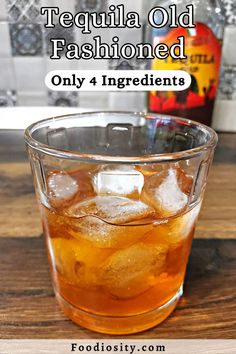 an old fashioned drink with ice in it