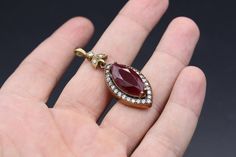 "I am offering you beautiful Turkish ottoman sterling silver & bronze drop pendant. Its %100 handcrafted workmanship with beautiful glass Ruby stone & Topaz beads with Unique workmanship. Please do not hesitate to contact if you have any questions. Weight : 7.6 grams, Length : Inches : 1.8\" ( 4.5cm ) Width : Inches 0.6\" ( 1.5cm ) Shipping & Estimated Delivery Time With Turkish Registered Post, Destination CountryStandard Shipping (business days) United States 15-20 Europe7-15 Asia1 Traditional Handmade Drop Jewelry, Traditional Faceted Jewelry For Gifts, Antique Teardrop Pendant Jewelry Gift, Antique Teardrop Jewelry As Gift, Carnelian Stone, Lapis Lazuli Stone, Ruby Stone, Gold Wash, Heart Shape Pendant