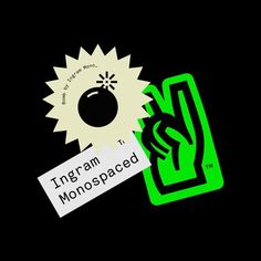 a green sticker with a hand holding a black object in the middle and a tag that says tigram monospaced on it