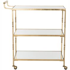 a gold metal and glass serving cart with two shelves on each side, one shelf is holding