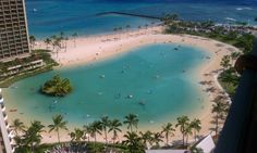 an aerial view of the beach and ocean in waikiki, oahua