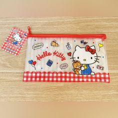 a hello kitty placemat and napkin on a table