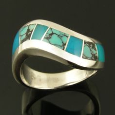 Sterling silver ring with spiderweb turquoise. Unique Turquoise Rings With Polished Finish, Unique Blue Turquoise Ring With Inlay, Unique Turquoise Jewelry With Inlay, Modern Turquoise Sterling Silver Ring With Polished Finish, Modern Sterling Silver Turquoise Ring With Polished Finish, Modern Turquoise Ring With Polished Finish, Modern Polished Turquoise Ring In Sterling Silver, Modern Turquoise Ring In Sterling Silver With Polished Finish, Sterling Silver Turquoise Inlay Jewelry